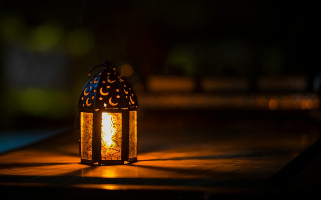 photo of ramadan light on top of table
